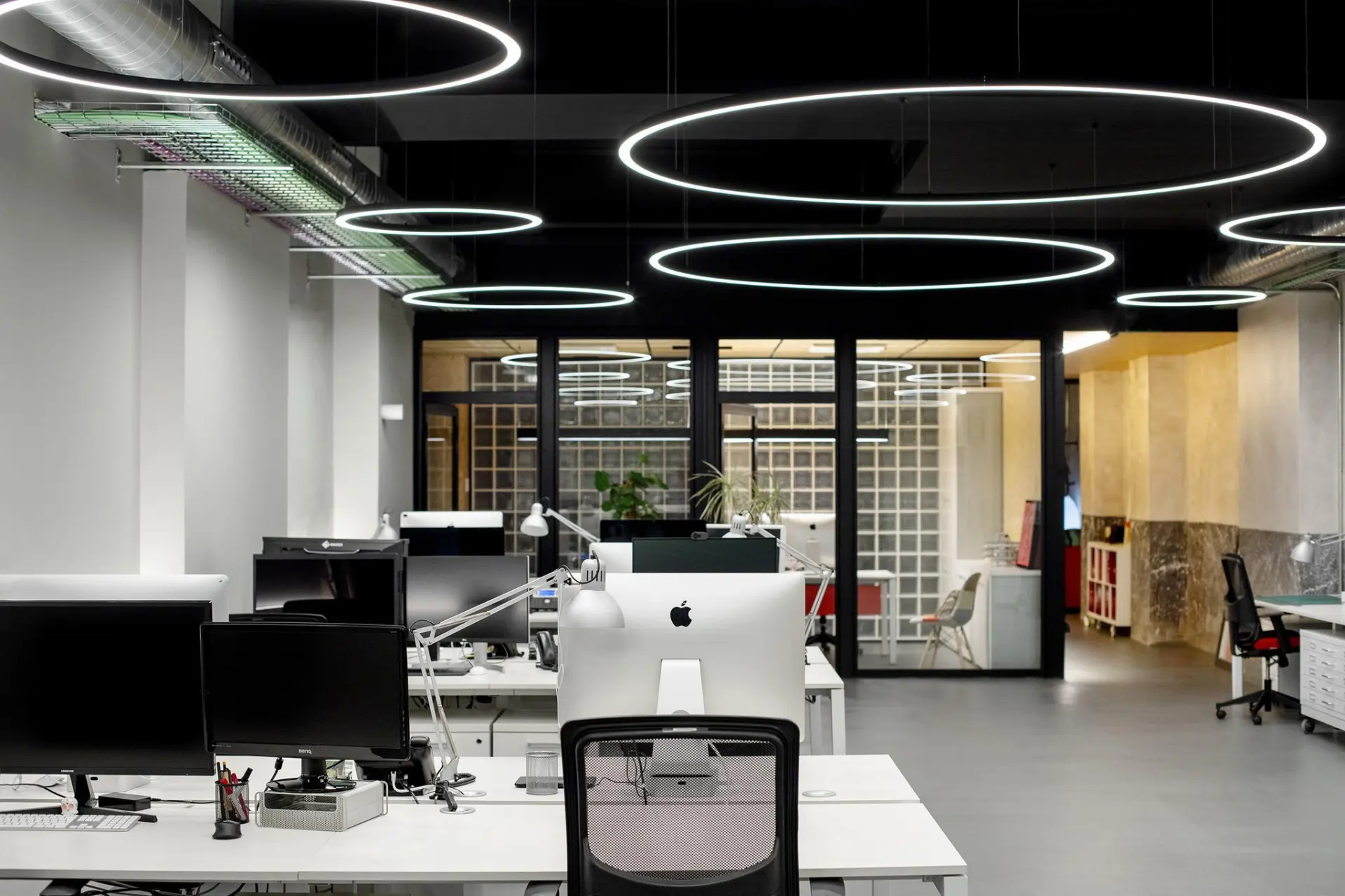 Circular linear light creating a clean geometric lighting feature in a modern interior