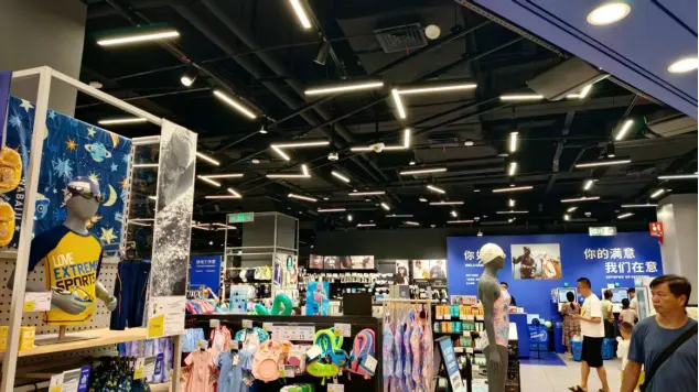 LED Track Grille Light providing controlled linear illumination in a Decathlon retail store